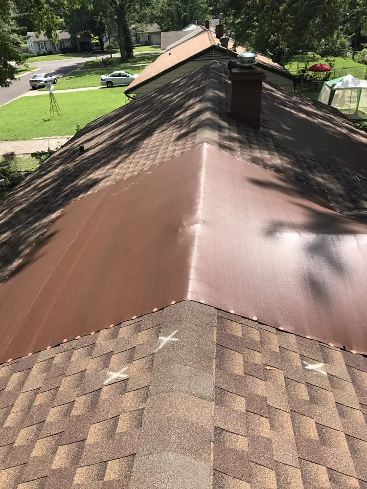 Slide of Brewster Roofing
