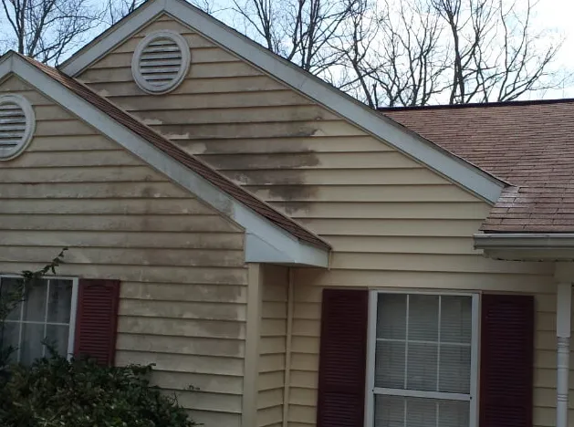 Emergency storm damage roof repair after storm damage in Tracys Landing, MD by Bright Exteriors