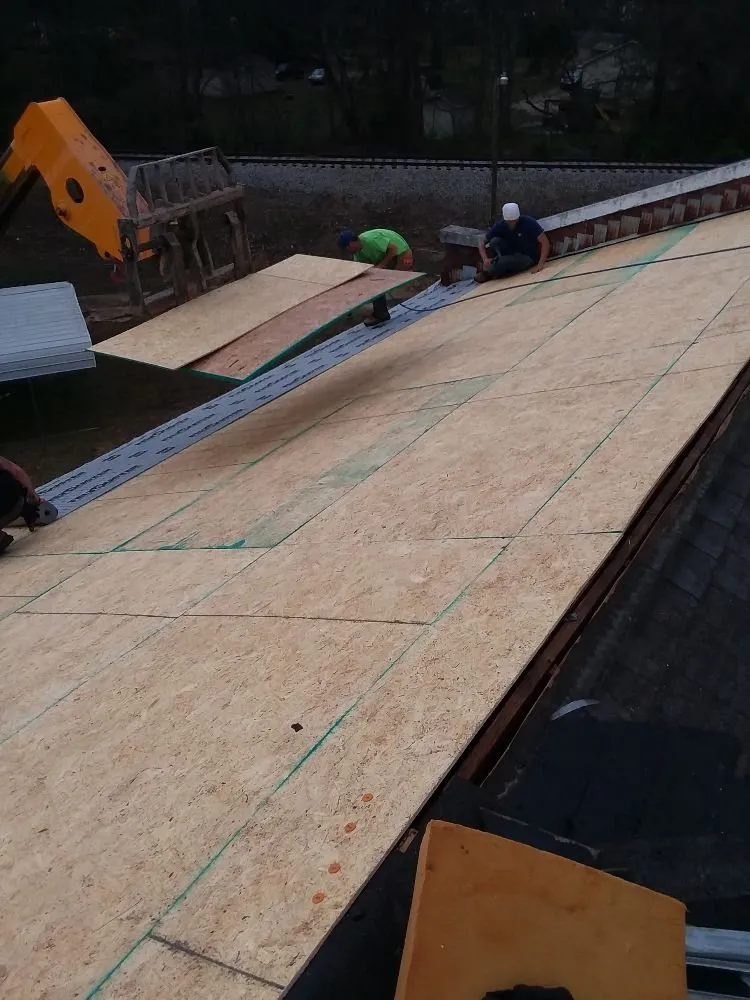 Slide of Britt Roofing and More