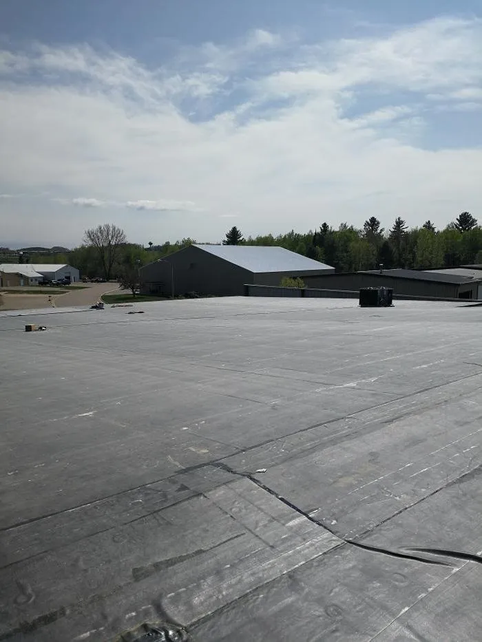 Top-rated flat roof repair near you in Harrison, MI by Britton Roofing