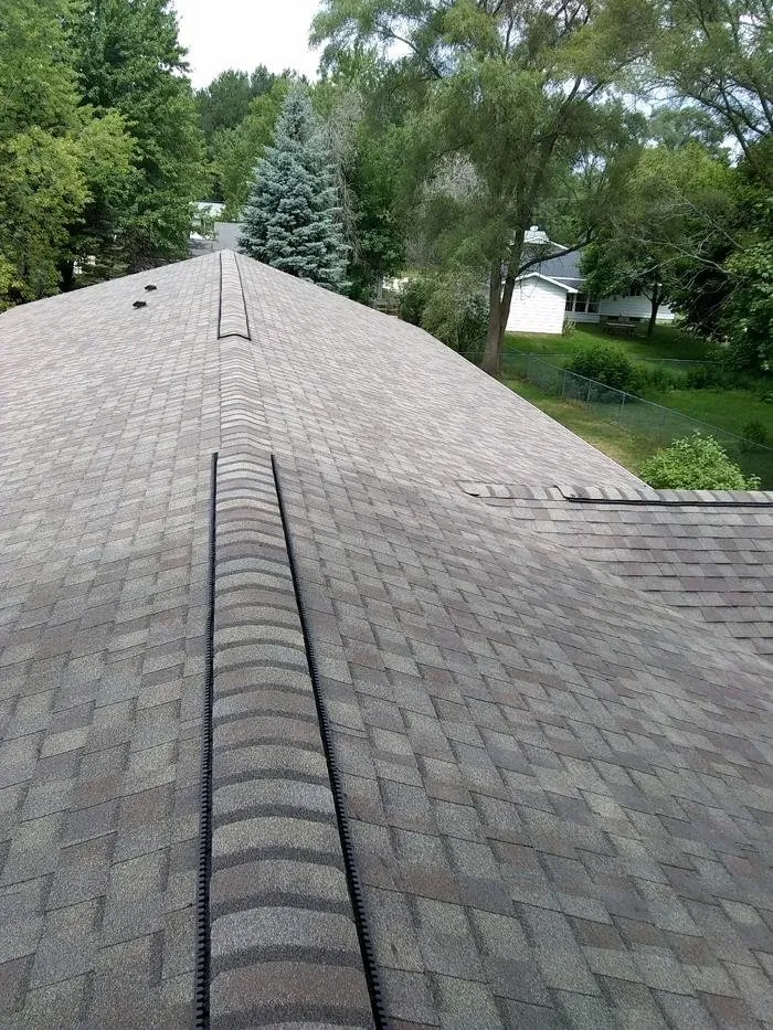 Trusted storm damage roof repair near you in Harrison, MI by Britton Roofing