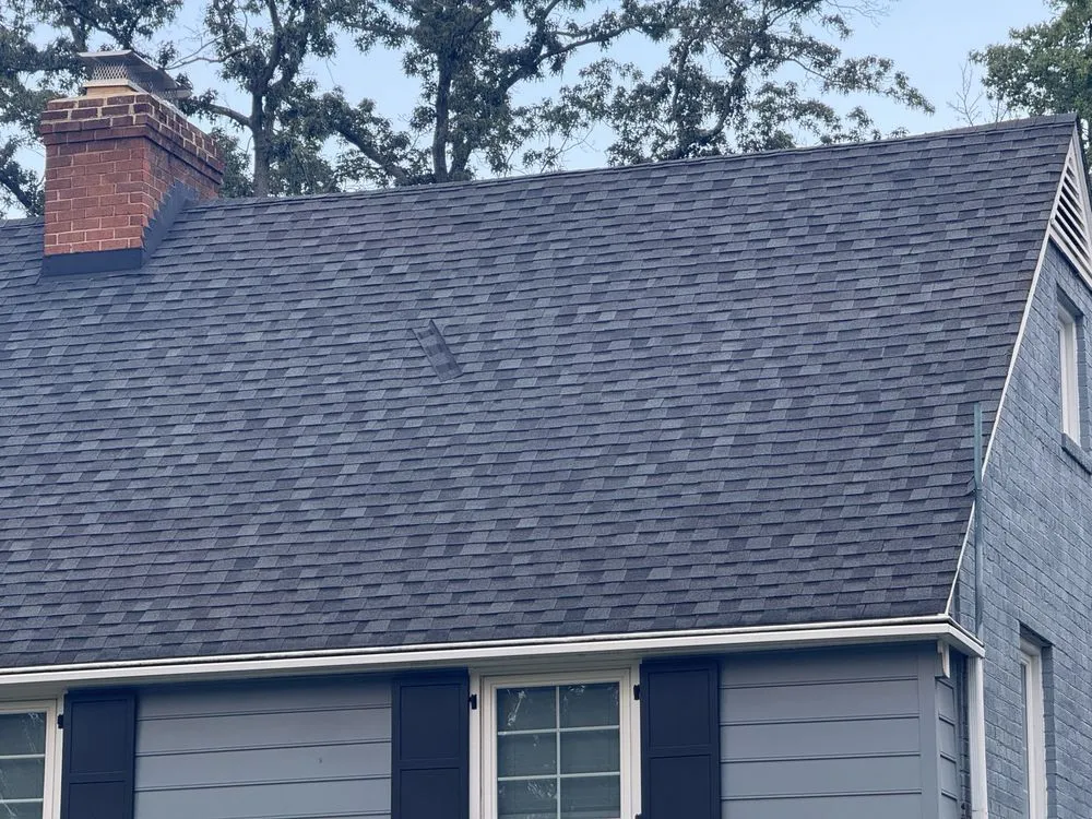 Slide of Britts Roofing