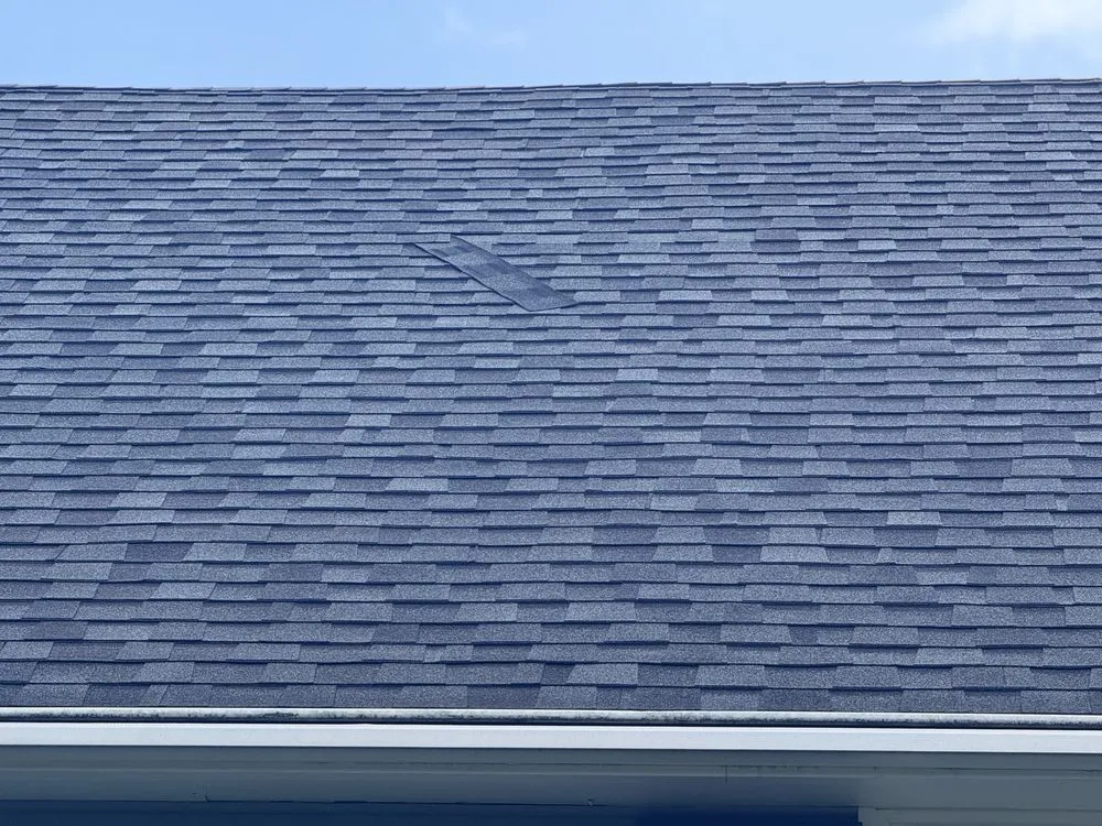 Slide of Britts Roofing