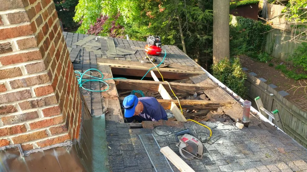 Slide of Britts Roofing