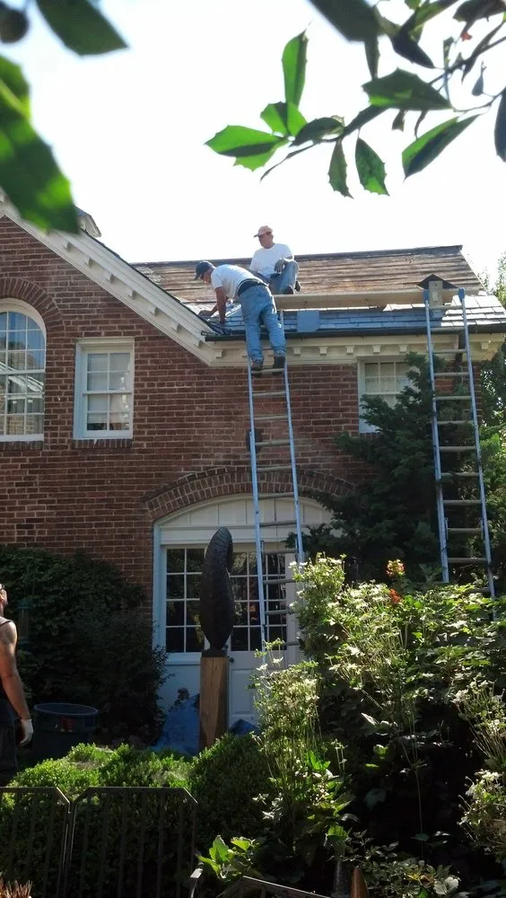 Slide of Britts Roofing