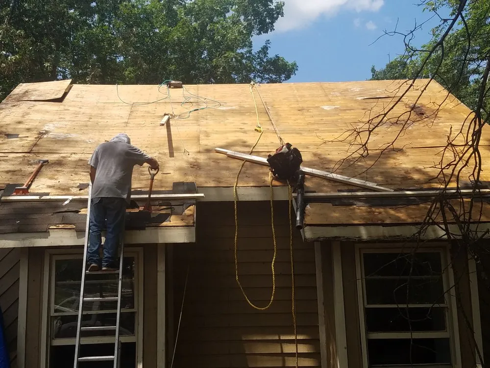 Slide of Brodie's Top Roofing