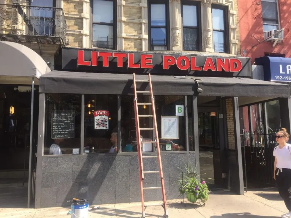 Slide of Brooklyn Roofer