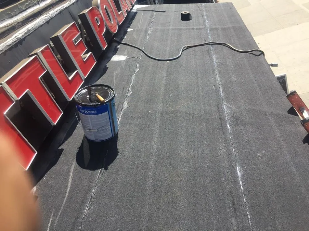 Slide of Brooklyn Roofer