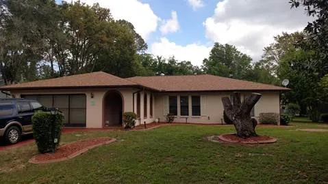 Slide of Brooksville Roofing