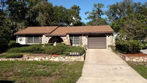 Slide of Brooksville Roofing