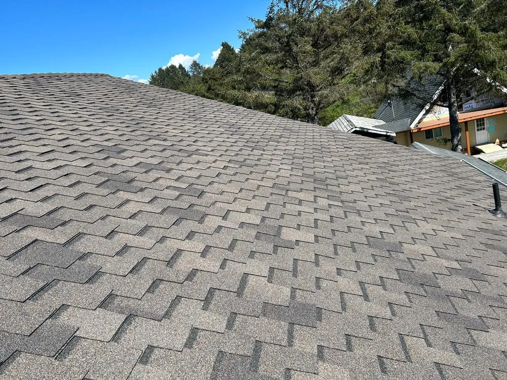 Slide of Brothers Roofing LLC