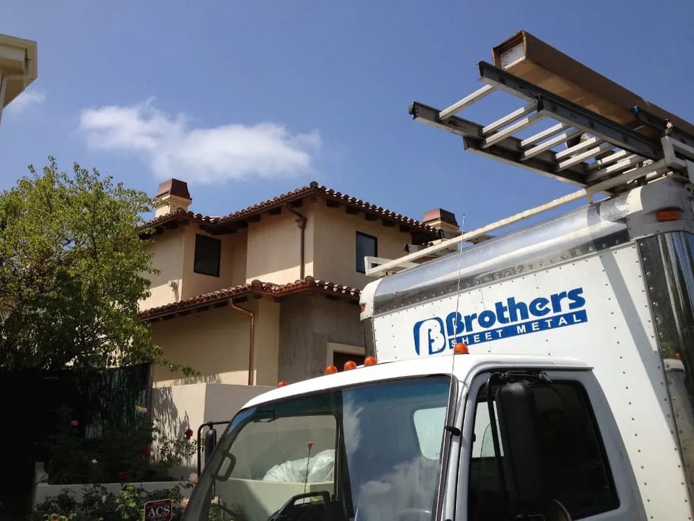 Slide of Brothers Sheetmetal & Rain Gutters