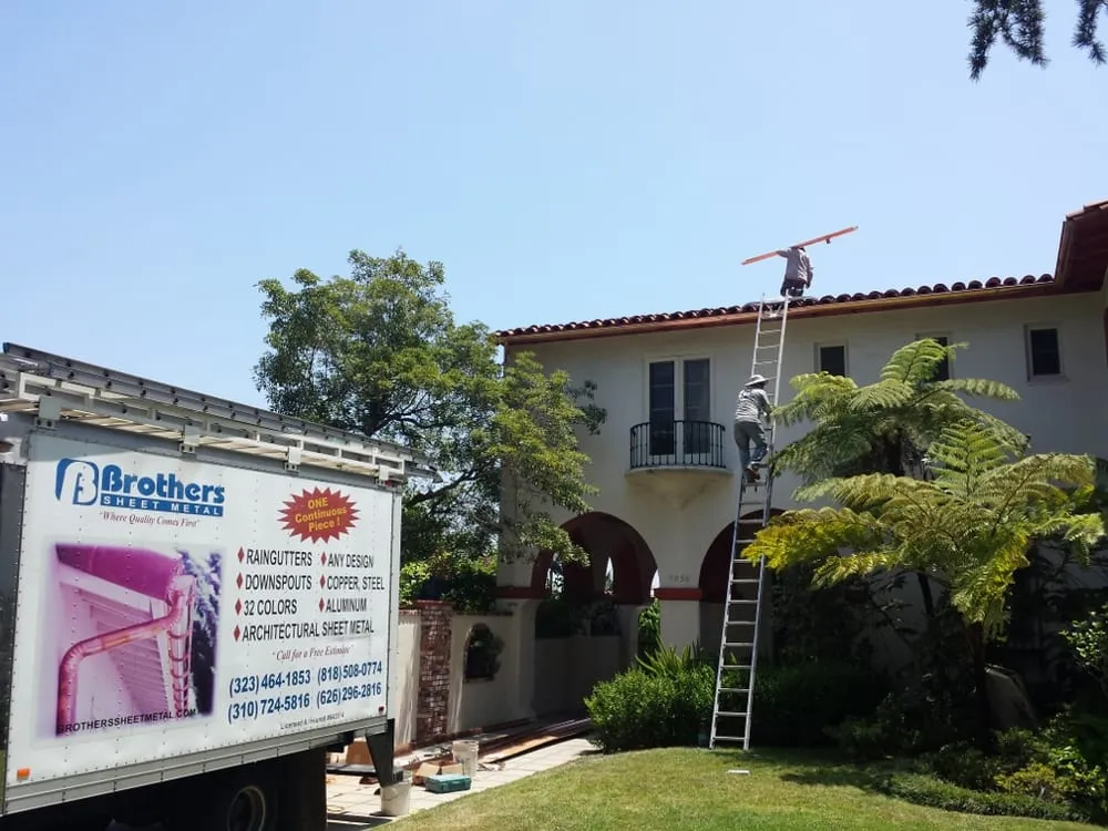 Slide of Brothers Sheetmetal & Rain Gutters