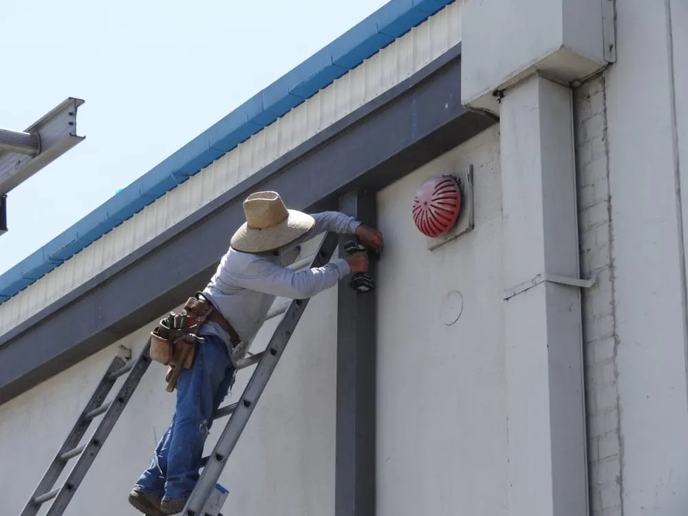 Slide of Brothers Sheetmetal & Rain Gutters