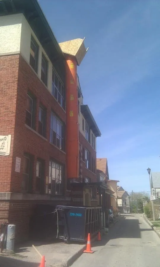 Slide of Brown Roofing and Siding