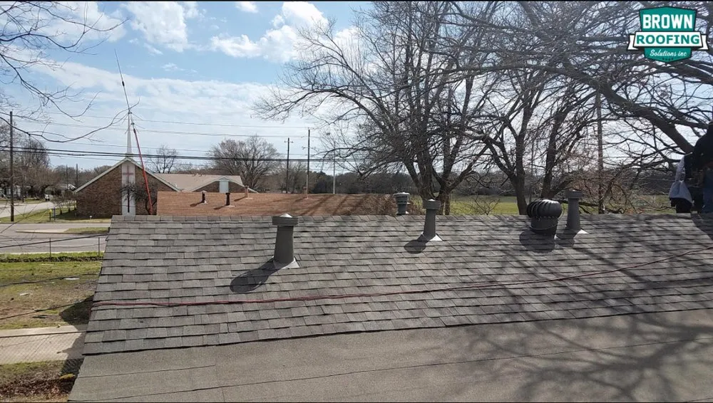 Slide of Brown Roofing Solutions