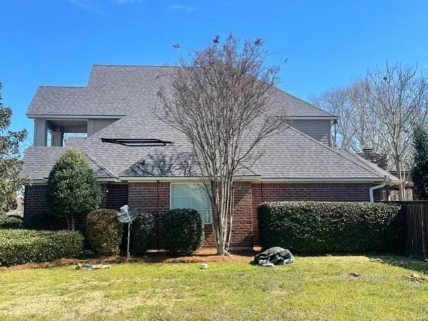 Slide of Brown's Roofing