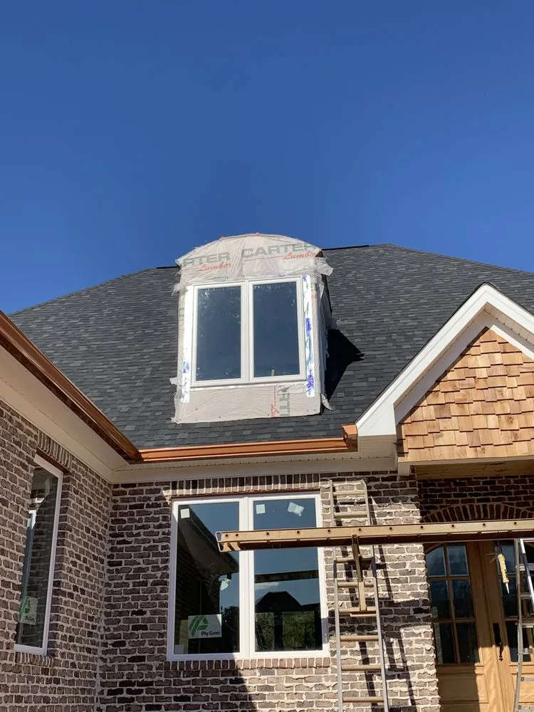 Slide of Brown's Roofing