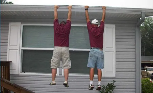 Emergency flat roof repair for fast service in Bay City, WI by Bruce Andrews Seamless Gutters