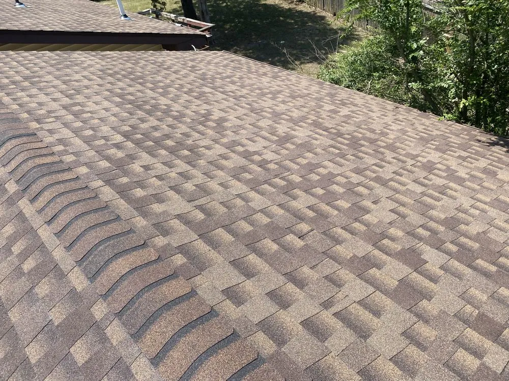 Slide of Brundige Roofing & More