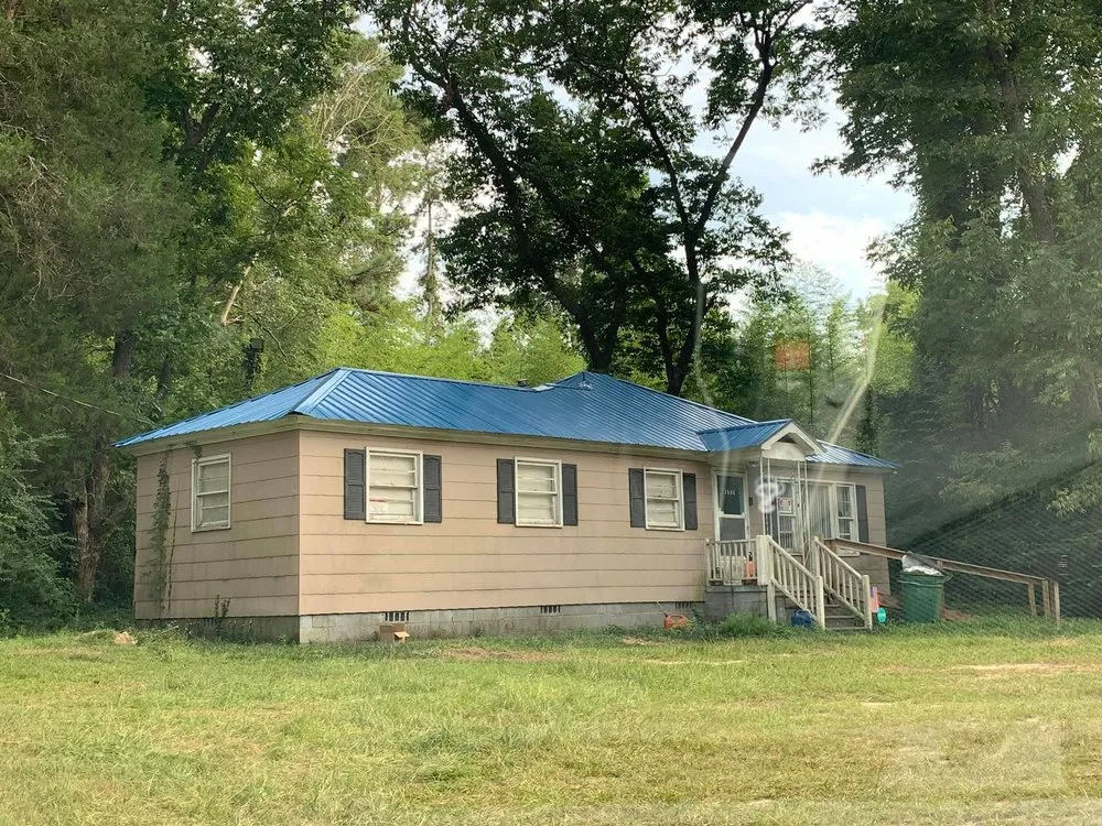 Slide of Brunson's Roofing