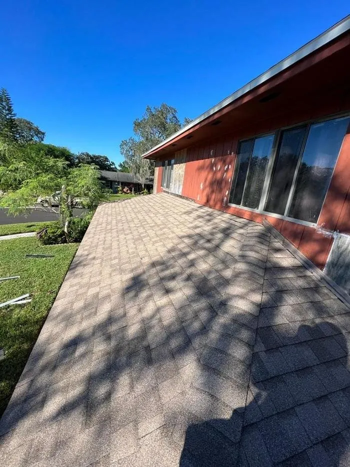 Slide of Bruzz Roofing