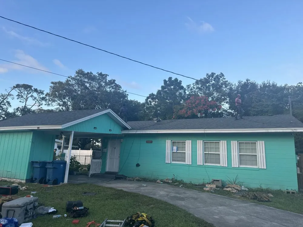 Slide of Bruzz Roofing