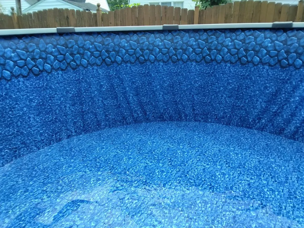 Slide of Bryan’s Pool Installations