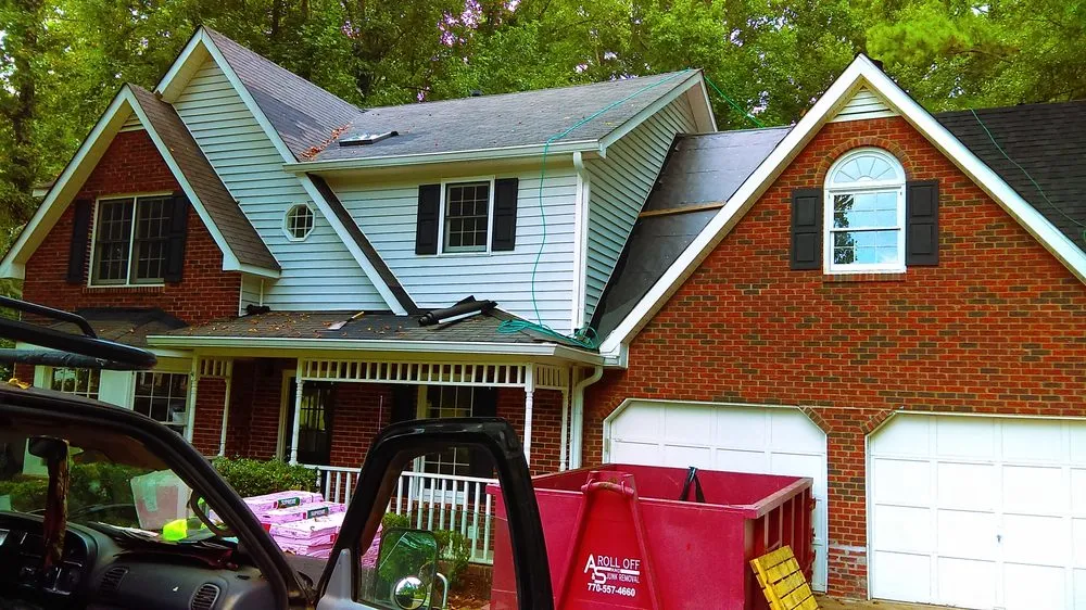 Slide of BS Roofing Repairs