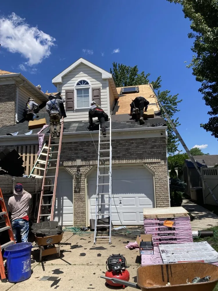 Slide of BSG Roofing