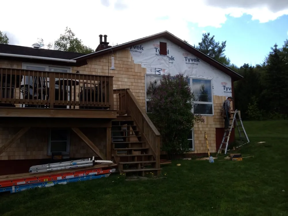 Slide of BT Painting and Roofing