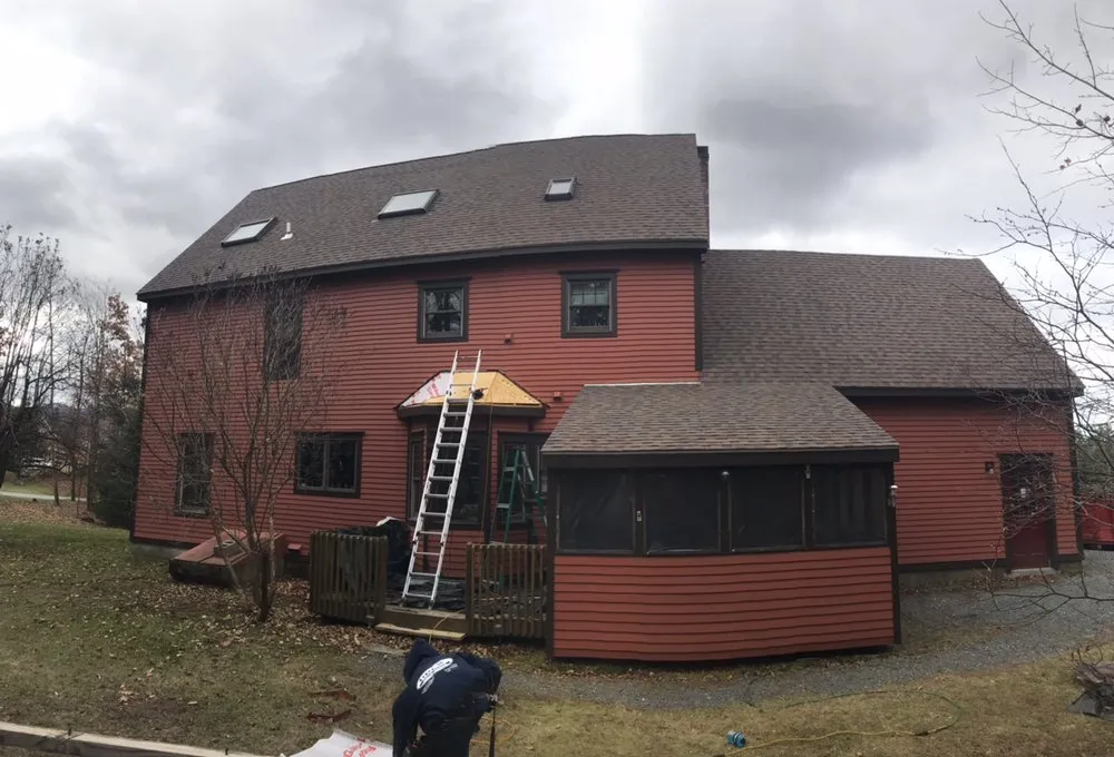 Slide of BT Painting and Roofing