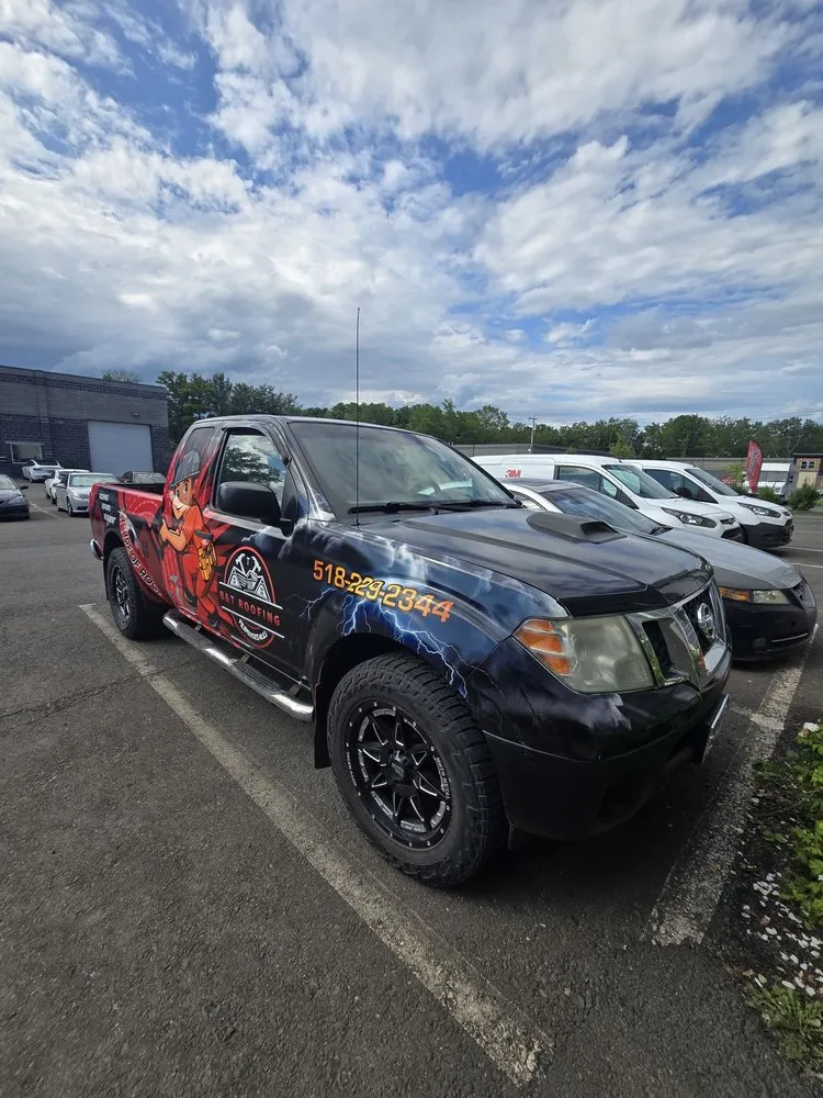 Slide of B&T Roofing