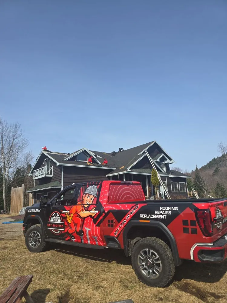 Slide of B&T Roofing