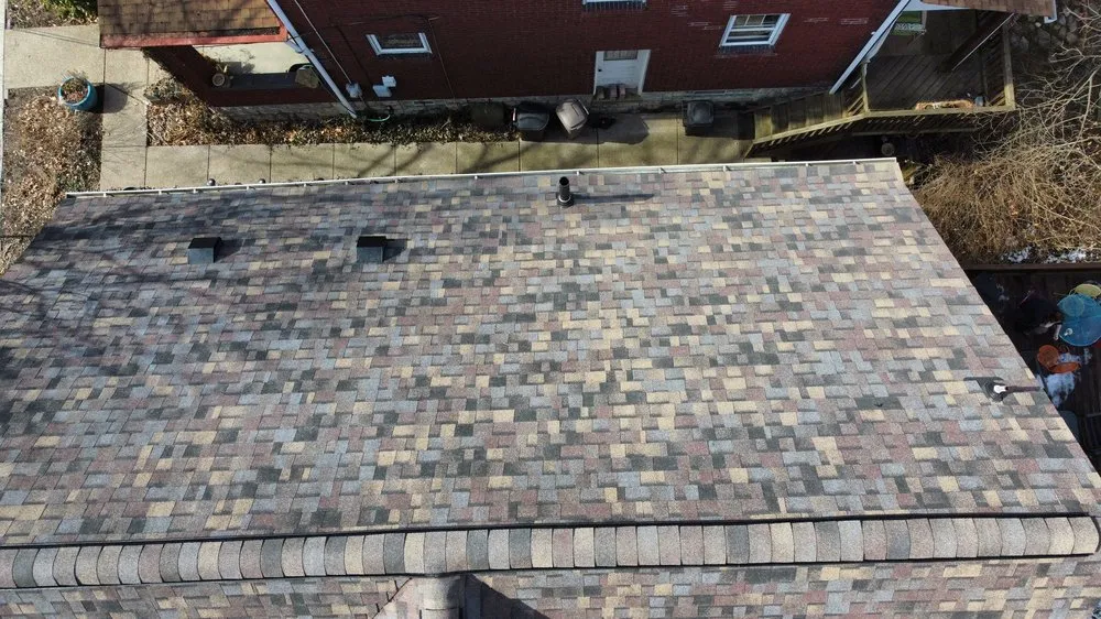 Slide of Buccos Roofing