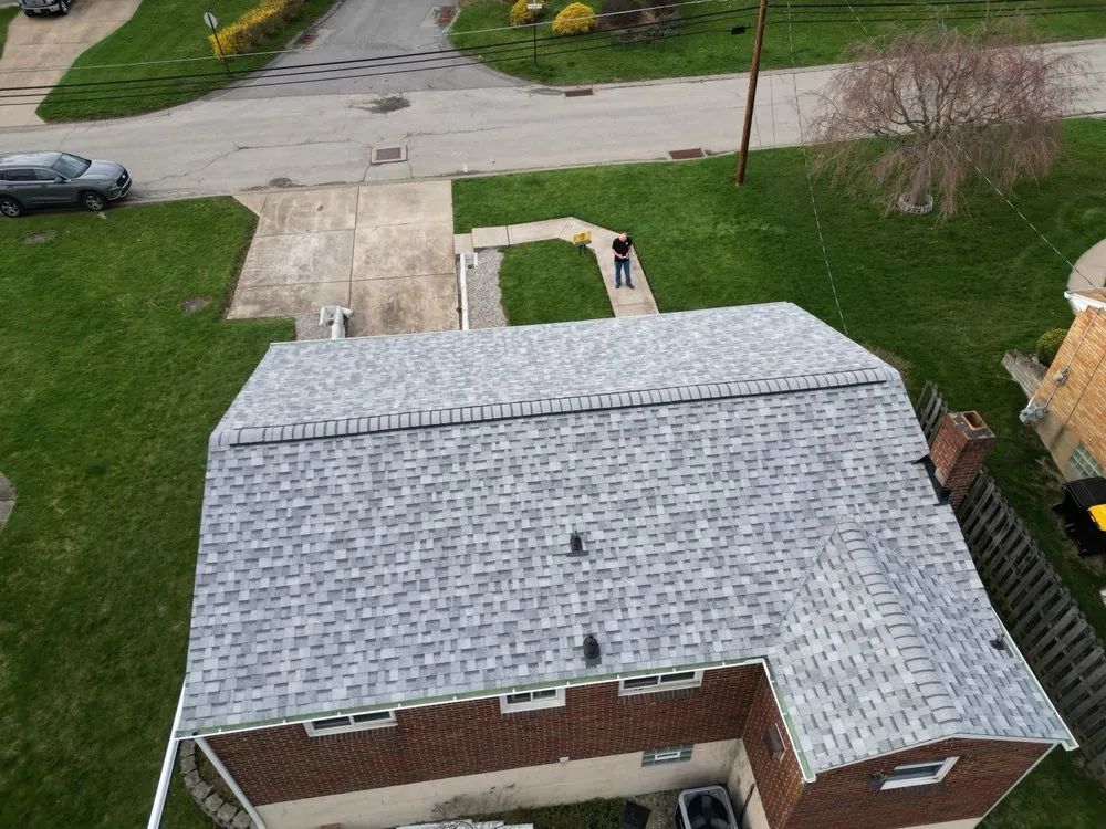 Slide of Buccos Roofing