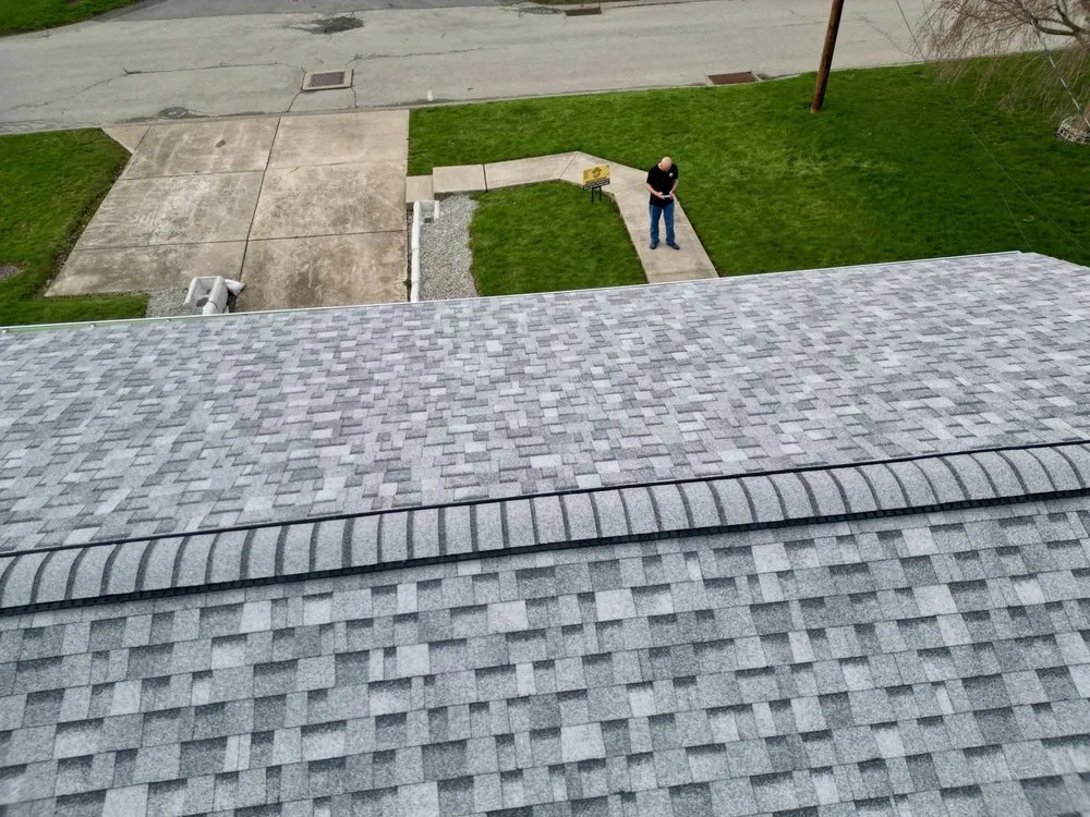 Slide of Buccos Roofing