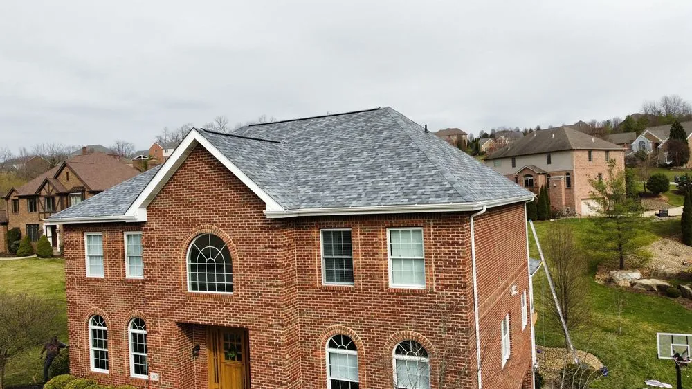 Slide of Buccos Roofing