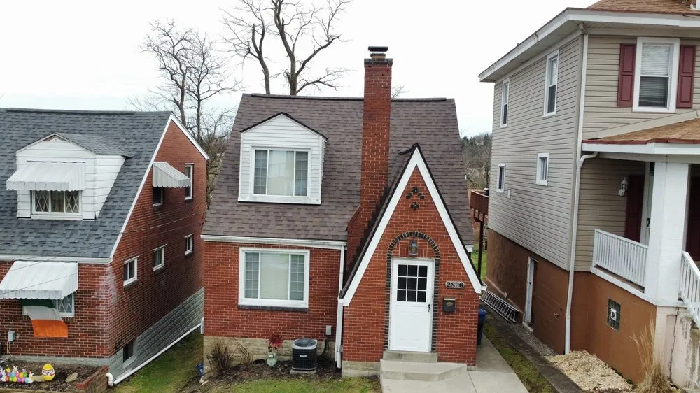 Slide of Buccos Roofing