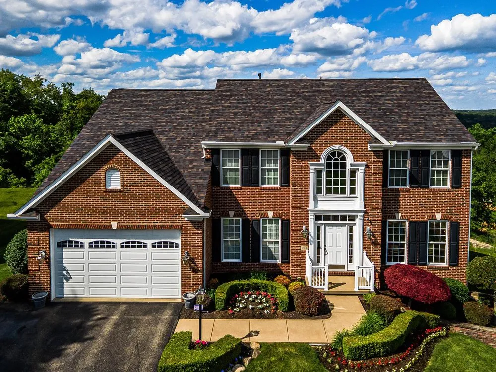 Slide of Buccos Roofing