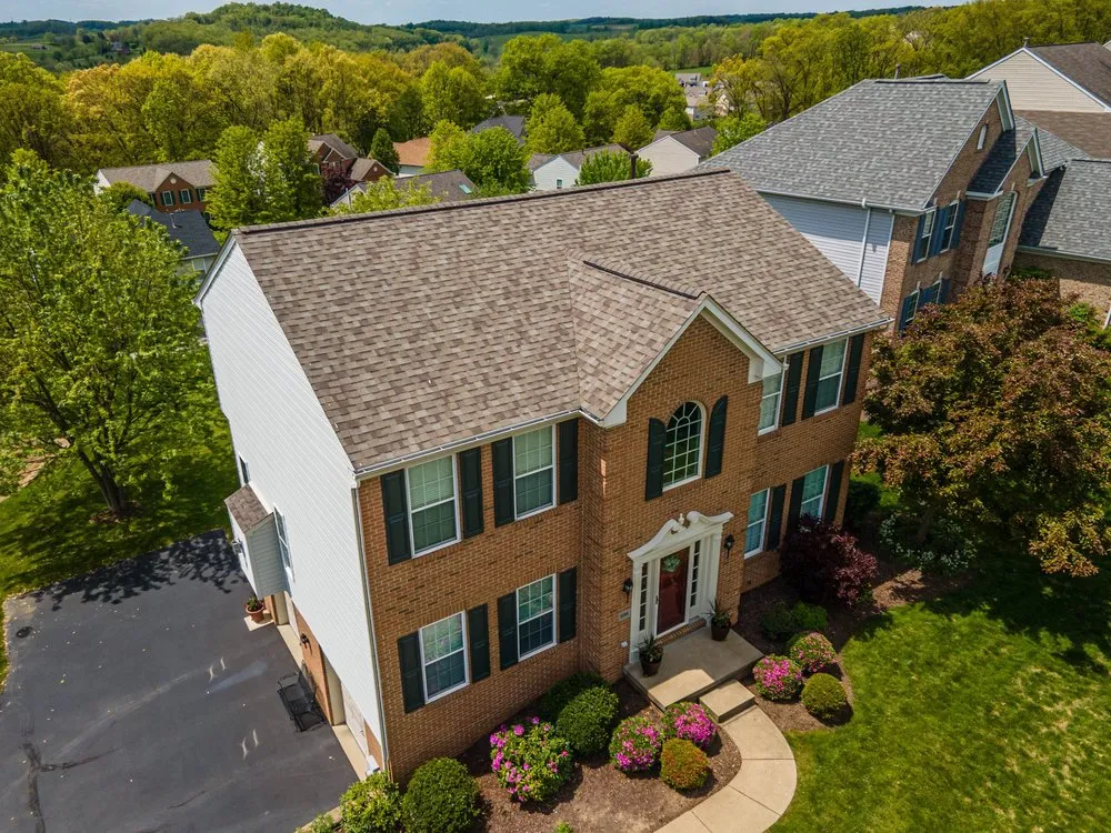 Slide of Buccos Roofing