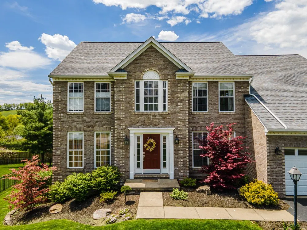 Licensed storm damage roof repair for homes in Cranberry Twp, PA by Buccos Roofing