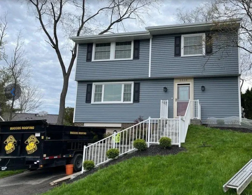 Slide of Buccos Roofing