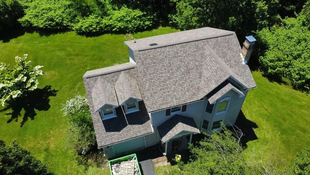 Slide of Buccos Roofing