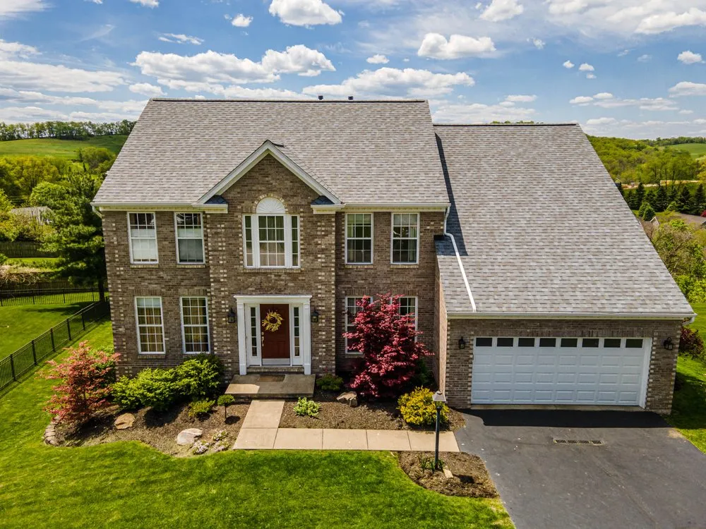 Slide of Buccos Roofing