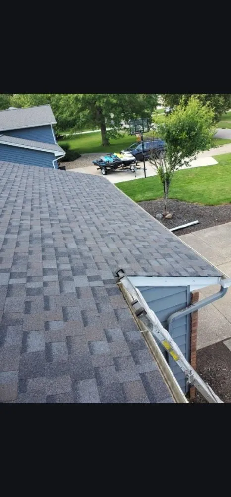 Slide of Buckeye Guys Roofing