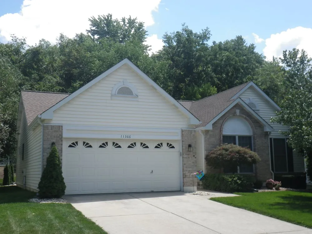 Emergency flat roof repair for homes in St. Louis, MO by Buckingham Exteriors, Roofing & Siding