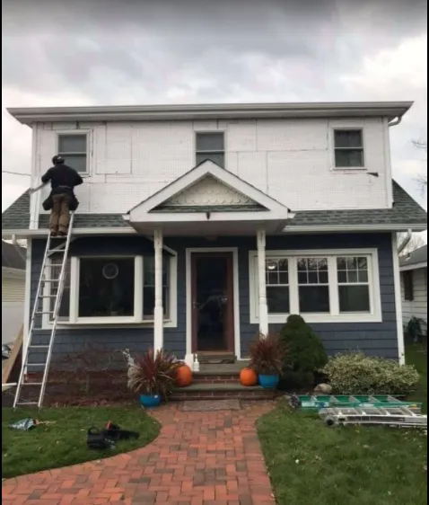 Slide of Bud Albrecht Roofing