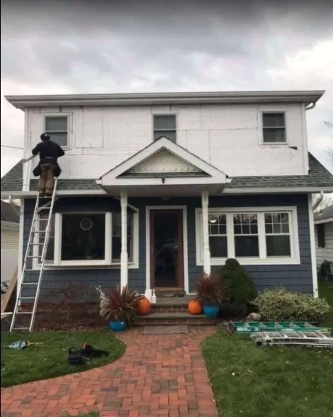Slide of Bud Albrecht Roofing