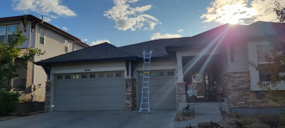 Slide of Budget Roof Colorado